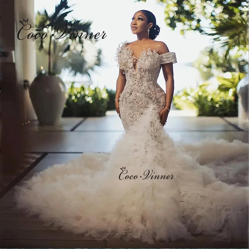 Customized Luxury Beading Mermaid Wedding Dress 2025 New Off The Shoulder Tulle Rufflus Africa Mermaid Wedding Dresses W1426